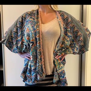 Two in one versatile shirt/wrap/strap tank